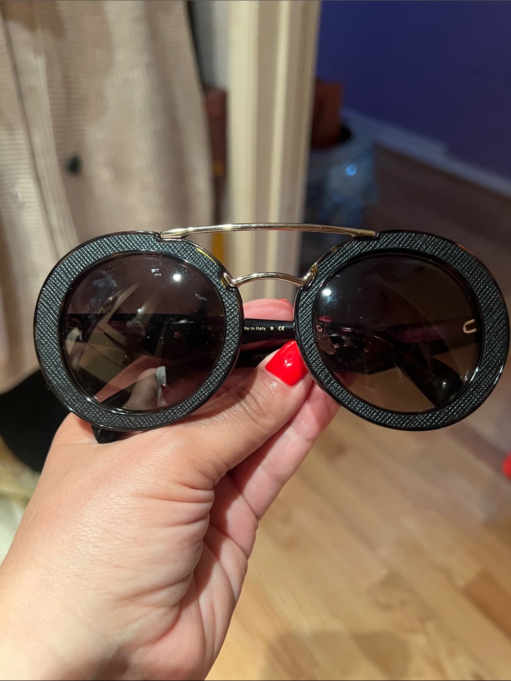 Prada Black Round Sunglasses with Gold Double Bridge